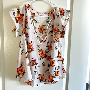 LUSH floral top size M